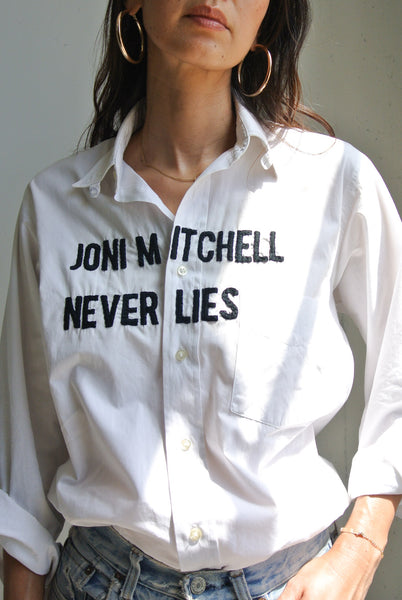 Hand embroidery on vintage shirt "Joni Mitchell never lies"